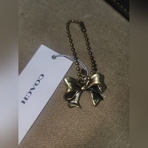 Coach New York Exclusive Bow Antique Gold Shoe Charm Wristlet Wallet Purse NWT